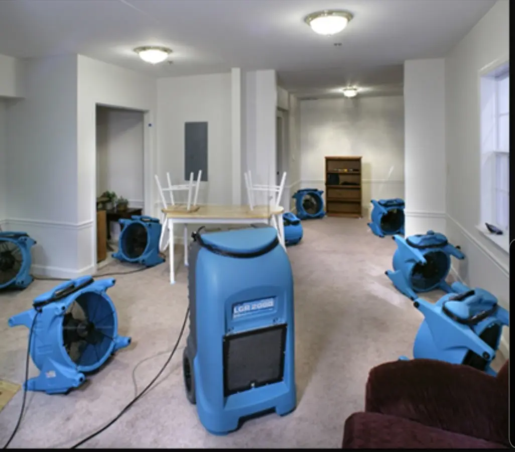 Air movers and dehumidifier setup for Water Damage Restoration in Gloucester